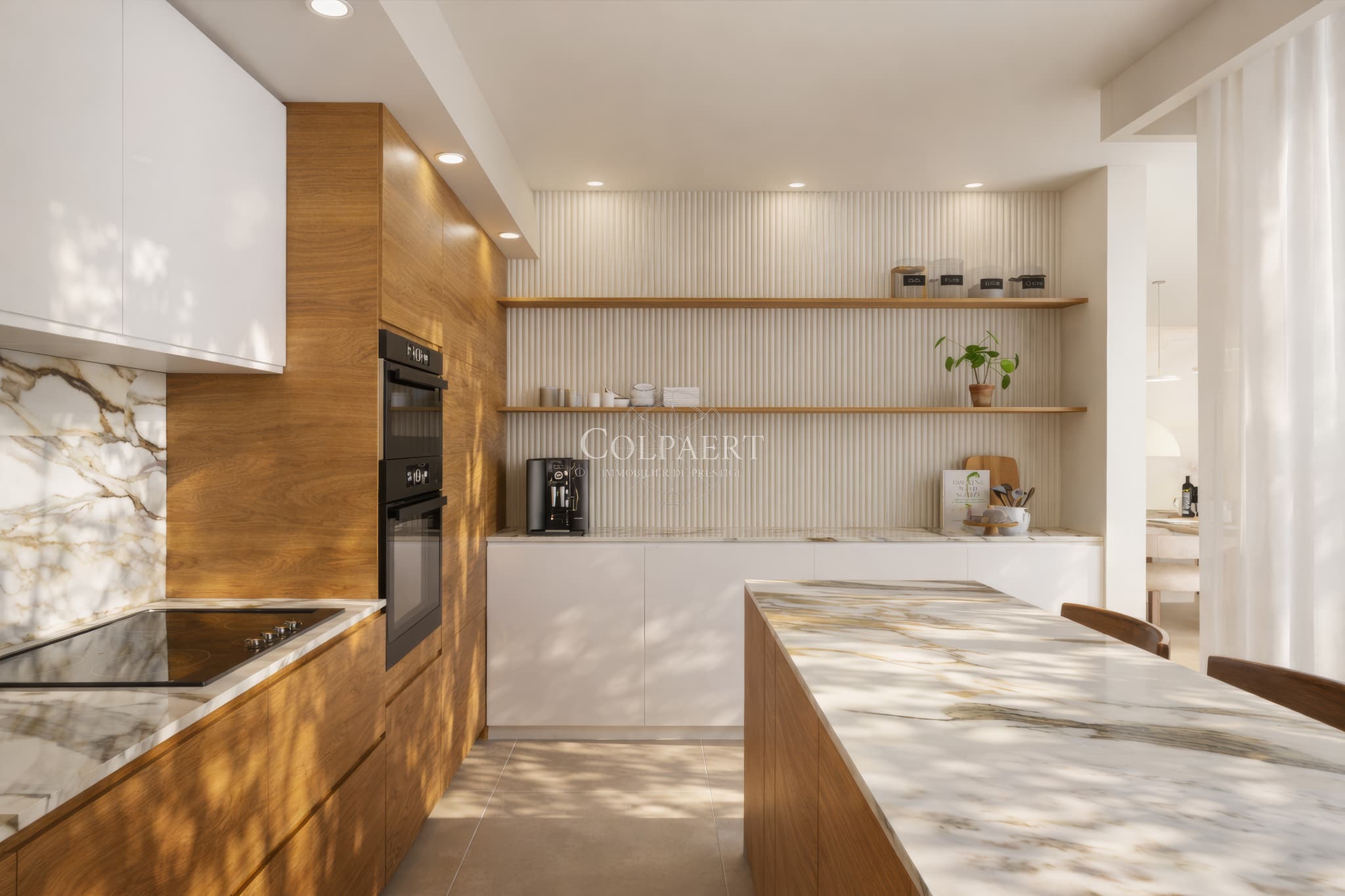 Cuisine haut de gamme avec finitions raffinées dans un appartement de luxe à Saint-Tropez, offrant design moderne et fonctionnalité au cœur de Patio Ruben.